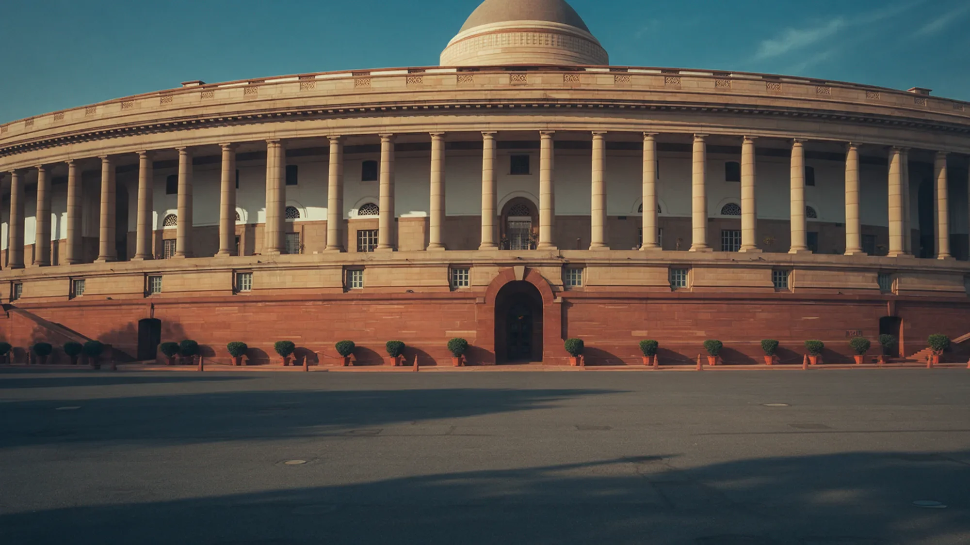 The Parliament of India building at blue hour